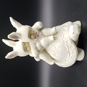 Vintage Snowbunnies by Department 56.  "It's working we are going faster "